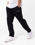 Russell Athletic Australia Men's Originals Big Arch Unbrushed Open Leg Track Pants - Black True Since 1902