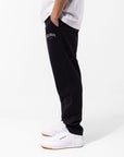 Russell Athletic Australia Men's Originals Big Arch Unbrushed Open Leg Track Pants - Black True Since 1902