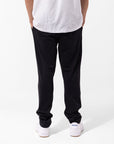 Russell Athletic Australia Men's Originals Big Arch Unbrushed Open Leg Track Pants - Black True Since 1902