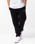 Russell Athletic Australia Men's Originals Big Arch Unbrushed Open Leg Track Pants - Black True Since 1902