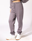 Elevate your style with our Russell Athletic Women's R Logo Track Pants - Shark.