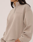 Russell Athletic Australia Women's R Tech Leisure Quarter Zip - String True Since 1902