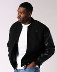 Russell Athletic Australia Men's R Logo Melton Varsity Jacket - Black True Since 1902