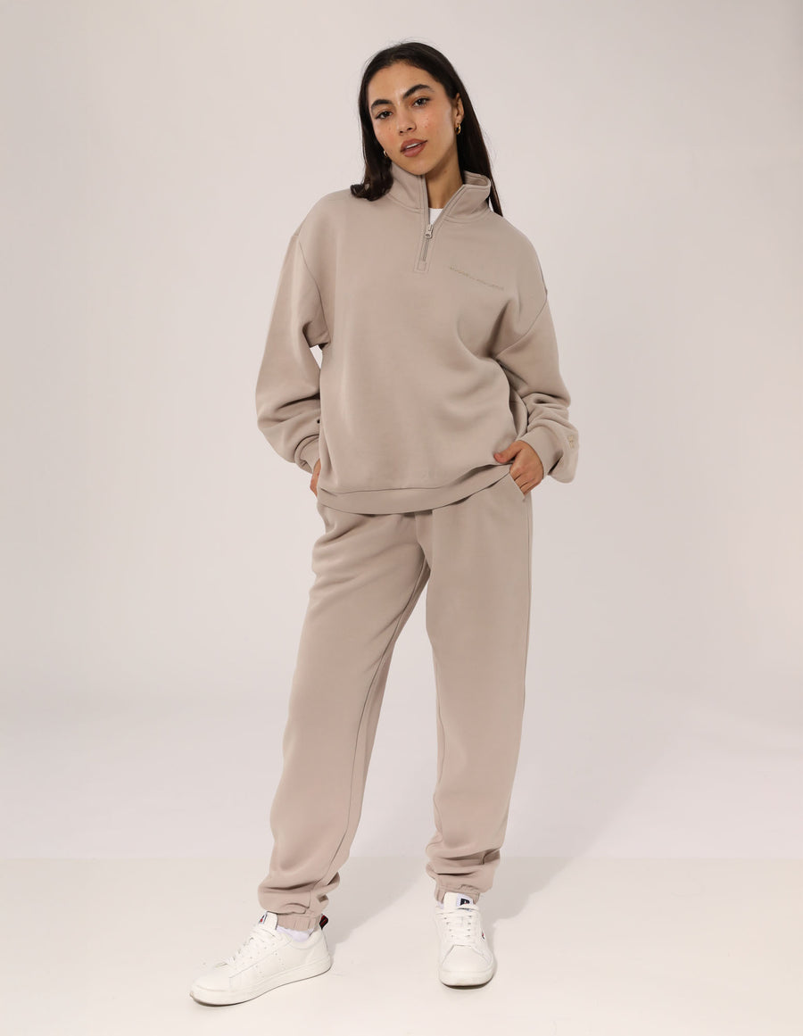 Russell Athletic Australia Women's R Tech Leisure Quarter Zip - String True Since 1902